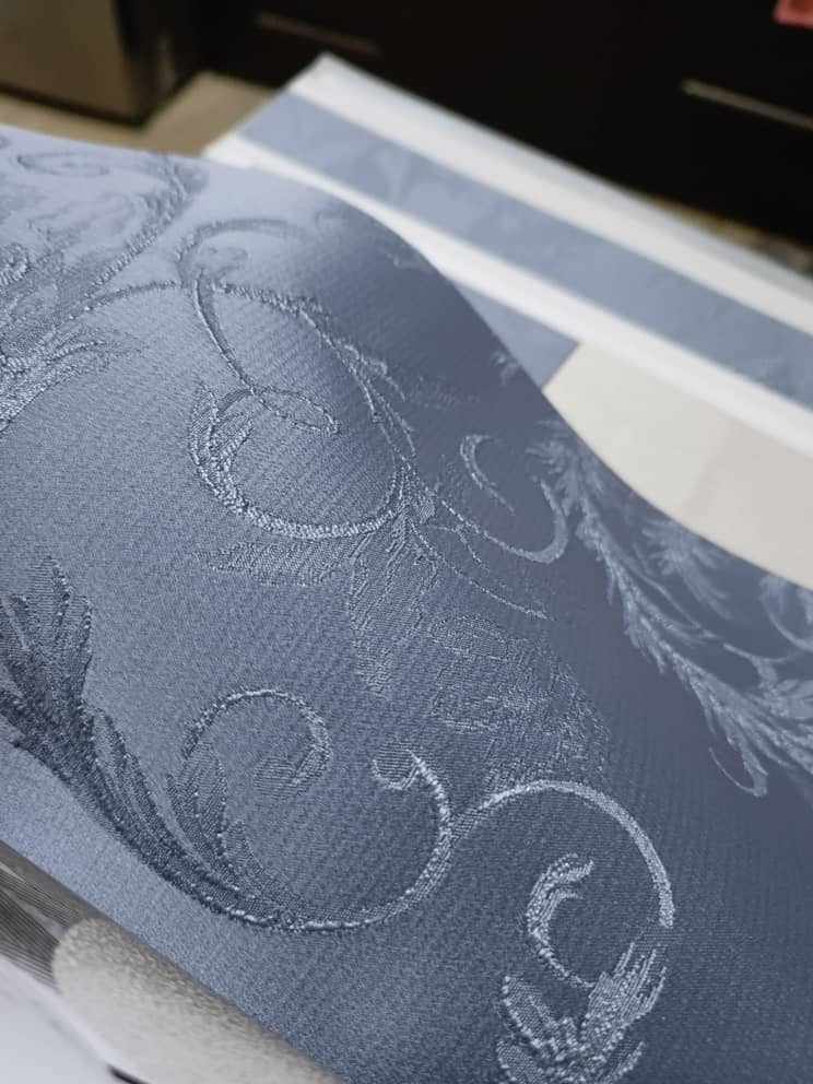Rich navy with silver embossed patterns